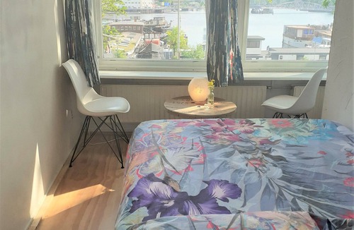 Nieuwmarkt en Lastage Bed & Breakfast | Bed'njoy clean cozy and central with astonishing view