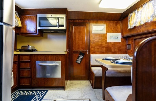 Aventura Boat Rental | Stay Aboard a Vintage Hatteras 53' Motor Yacht in Aventura-A Unique Experience!