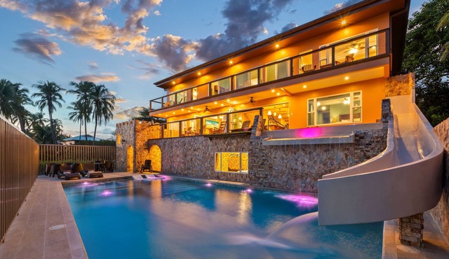 BEACH Castle w/WATERSLIDE, WATERFALL, 2 Pools on SANDY BEACHFRONT August Discount! in Junquillal