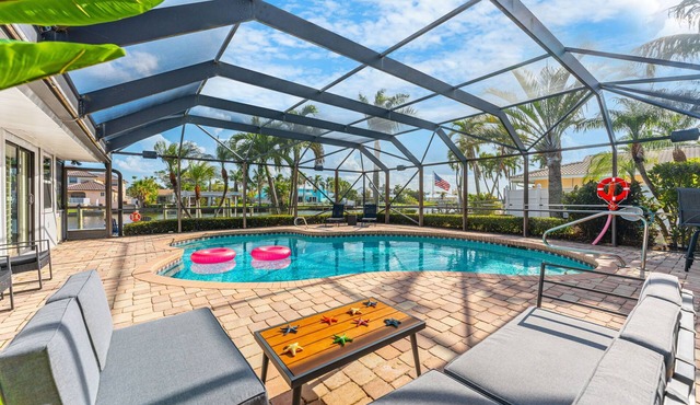 Canal Access: Boat Lift, Heated Pool & Dock in Cocoa Beach