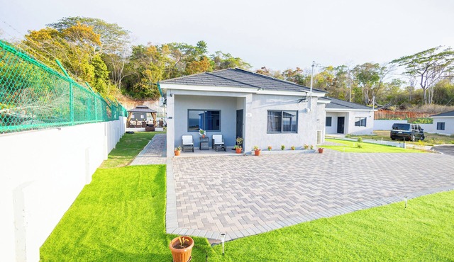Elegant 3-bedroom Jamaican escape with AC and stunning ocean view in Runaway Bay in Runaway Bay