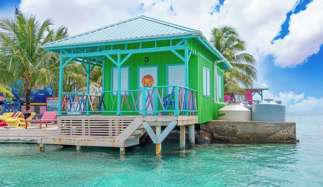 Green Parrotfish Overwater Cabana with Sunset Views Belize in Placencia