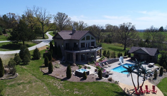 Scenic Lakeside Chateau with Heated Pool, Hot Tub & Outdoor Kitchen-TV-Fireplace in Belle