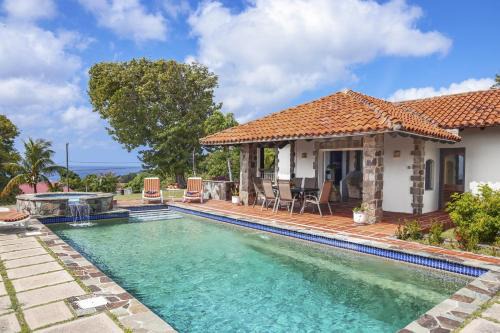 Spanish-style Ocean view Villa set in garden - Calypso Court villa in Cap Estate