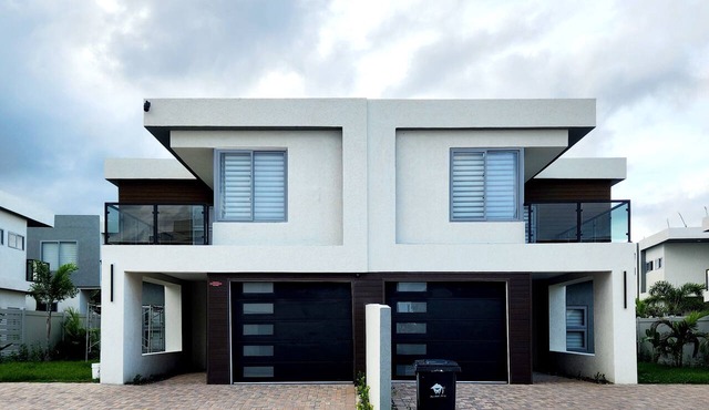 The Onyx Beach Villa by MTJ Properties in Plantation Village