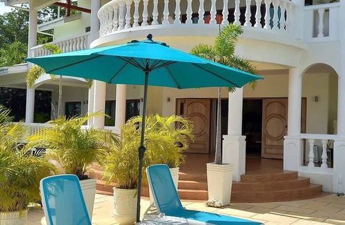 Glacis Villa | Delightful Villa with Infinity Pool & Tropical Garden